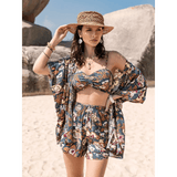 Trendsi floral print short set worn by woman on beach as a trendy vacation outfit women
