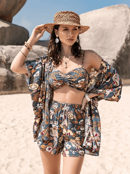 Trendsi floral print short set worn by woman on beach as a trendy vacation outfit women