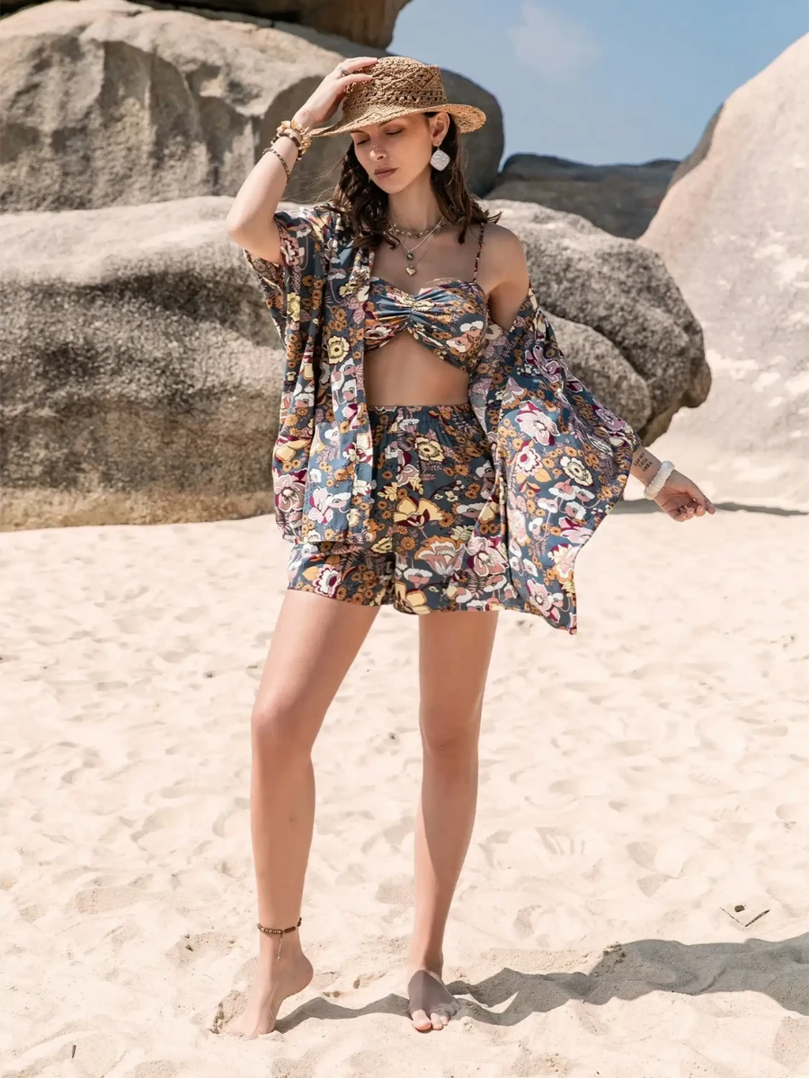 Trendsi short set with floral print worn as trendy vacation outfit women on the beach