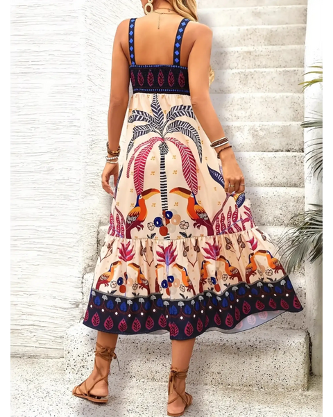 Woman showing back of  tropical summer dress for women midi length with colorful palm and bird print