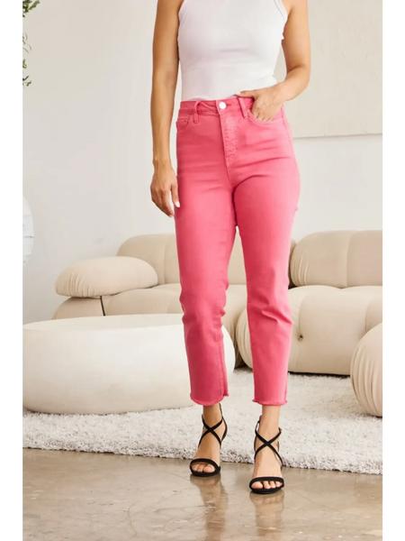 Trendsi pink tummy control high waist jeans worn with a white tank top and black sandals