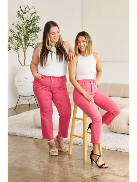 Two women wearing pink tummy control high waist jeans by Trendsi, styled with white tops and heels