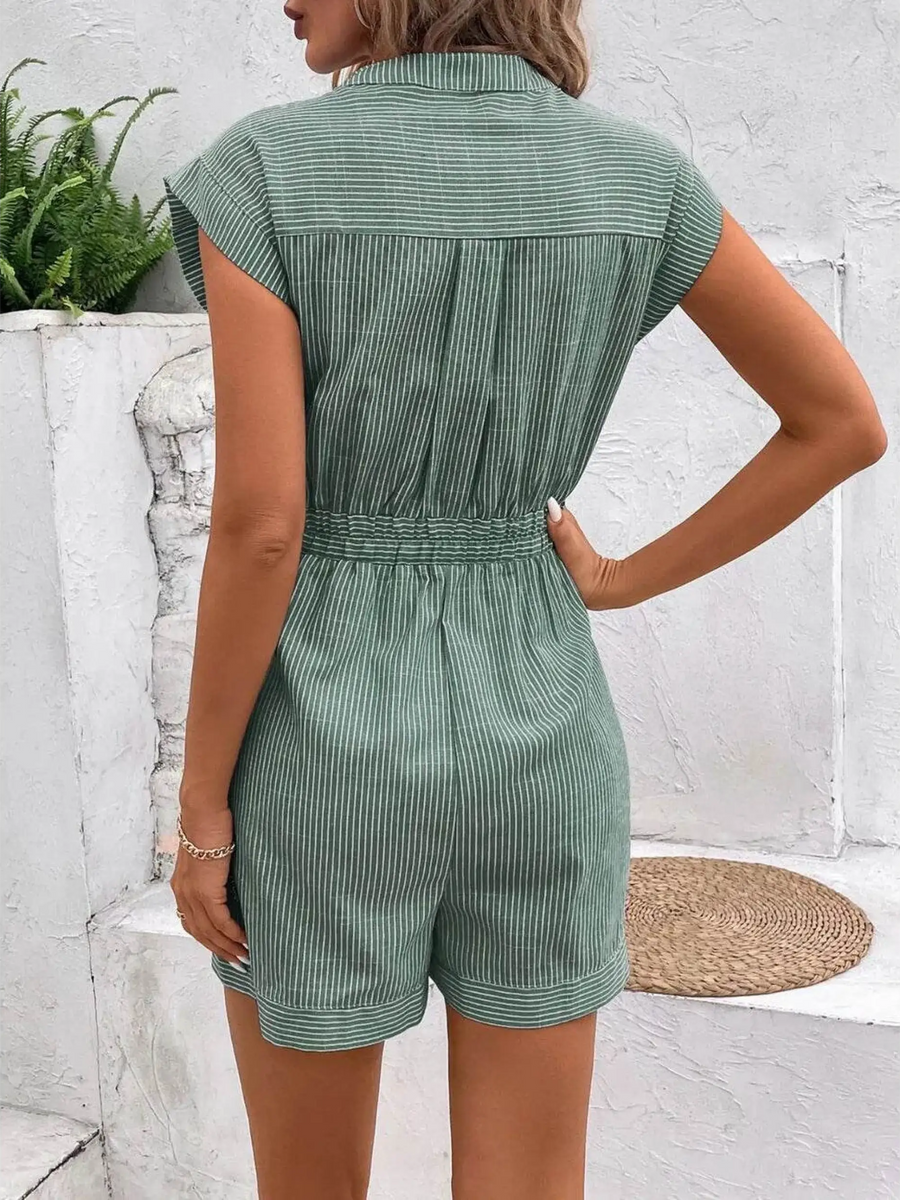 Back view of Babe Beachwear green striped waist tie romper with short sleeves and cuffed shorts