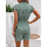 Back view of Babe Beachwear green striped waist tie romper with short sleeves and cuffed shorts