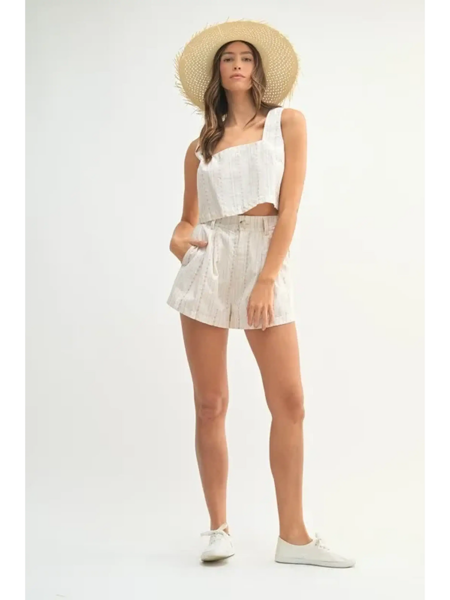 White Beach Summer Crop top Short set worn by woman with sun hat and white sneakers