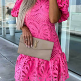 Trendsi pink lace midi dress with puff sleeves held with beige YSL clutch purse