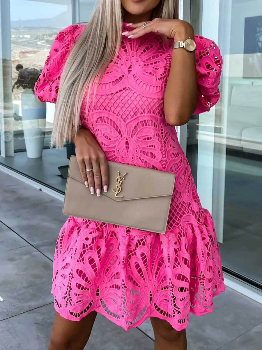 Trendsi pink midi dress with intricate lace design and puff sleeves styled with neutral clutch