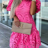 Trendsi pink midi dress with intricate lace design and puff sleeves styled with neutral clutch