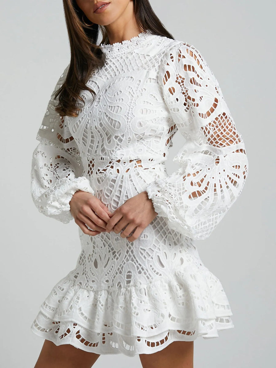 Babe Beachwear white lace mini cocktail dress with long puff sleeves and ruffled hem