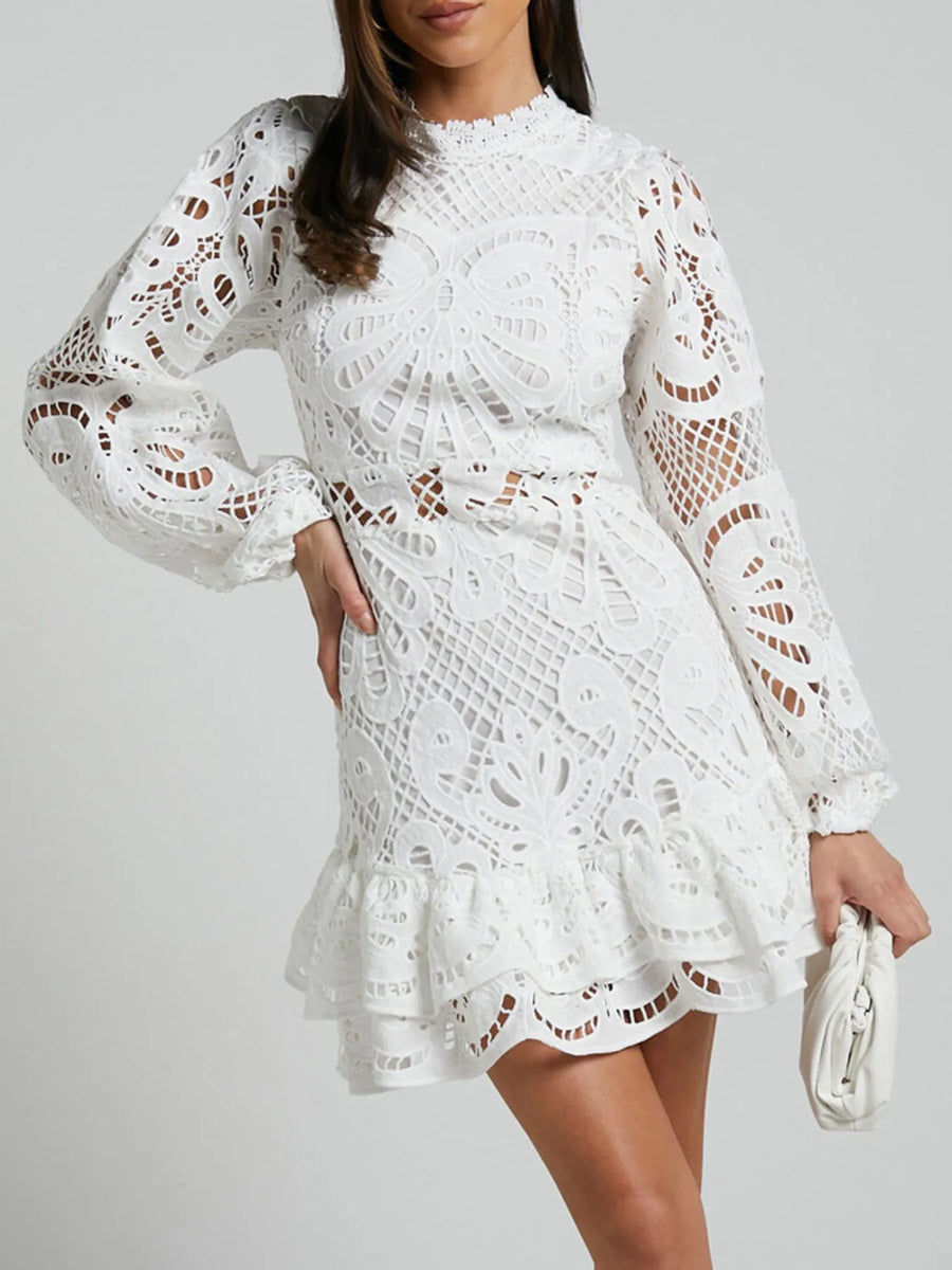 Babe Beachwear white lace mini cocktail dress with long sleeves and ruffled hem