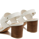 Rag Company tan slingback block heel sandals with white straps and stacked wooden heels