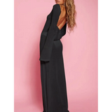 Trendsi black maxi dress with open back styled as white swimsuit cover up long sleeve beachwear
