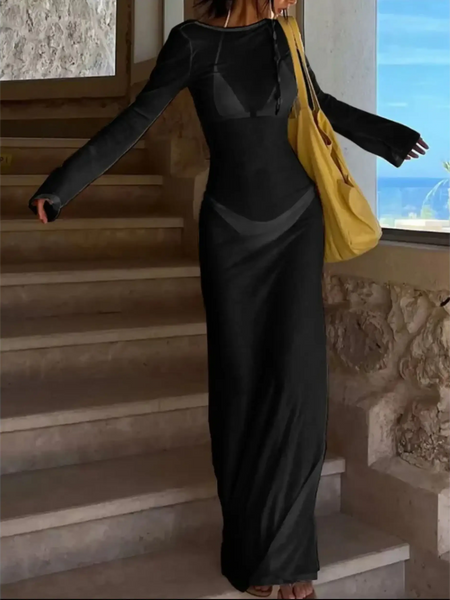 Trendsi black maxi dress worn by woman descending stairs, styled as white swimsuit cover up long sleeve