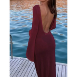 Trendsi maroon maxi dress with long sleeves and deep open back by the water dock
