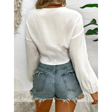 Trendsi white tie front long sleeve cropped top with balloon sleeves worn with distressed denim shorts
