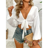 Trendsi white tie front long sleeve cropped top with deep v-neck and relaxed fit