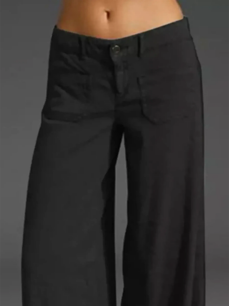 Babe Beachwear wide leg pocketed pants mid rise in black with button closure and front pockets