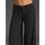 Babe Beachwear wide leg pocketed pants mid rise in black with button closure and front pockets