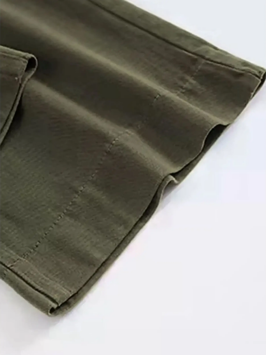 Close-up of Babe Beachwear wide leg pocketed pants mid rise in olive green fabric detail