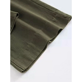 Close-up of Babe Beachwear wide leg pocketed pants mid rise in olive green fabric detail