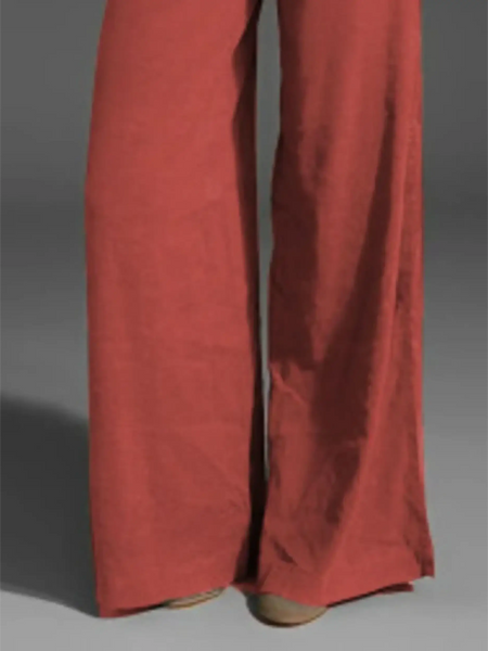 Babe Beachwear wide leg pocketed pants mid rise in rust color with flowy fabric and relaxed fit