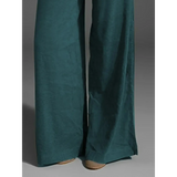 Babe Beachwear wide leg pocketed pants mid rise in teal with flowy fabric and relaxed fit