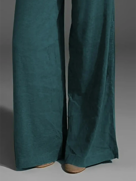 Babe Beachwear wide leg pocketed pants mid rise in teal with flowy fabric and relaxed fit