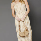 Trendsi cream latte wide leg sleeveless summer jumpsuit with floral print and casual fit