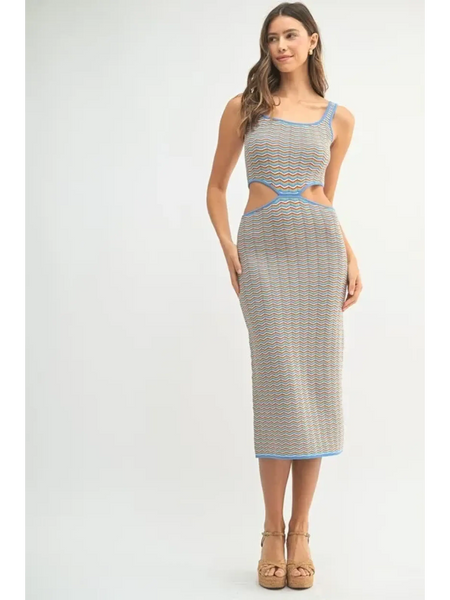 lovely chevron knit bodycon midi dress with cutout sides and blue trim worn by model