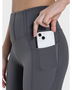  women's active leggings with pockets in dark gray showing phone stored in side pocket