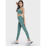 Trendsi women's active leggings with pockets in teal paired with matching sports bra and white sneakers