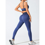 Trendsi women's athletic cami leggings set in navy blue shown from back with black stripes