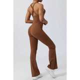 Babe Beachwear women's athletic crisscross jumpsuit in brown with fitted silhouette and flared legs