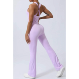Babe Beachwear women's athletic crisscross jumpsuit in lavender with fitted design and flared legs