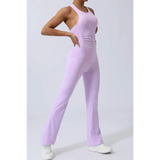 Babe Beachwear women's athletic crisscross jumpsuit in lavender color with fitted design and flared legs