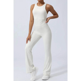 Babe Beachwear women's athletic crisscross jumpsuit in white, sleeveless activewear with fitted waist and flared legs