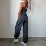 Trendsi women's beach jumpsuit in black with crisscross back and relaxed fit pants