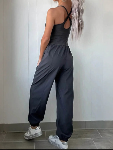 Trendsi women's beach jumpsuit in black with crisscross back and relaxed fit pants