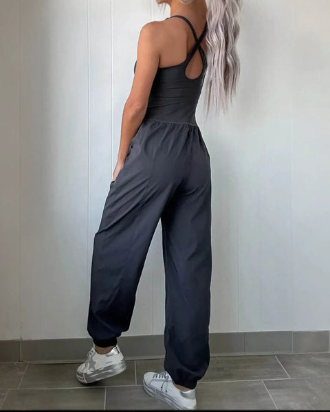 Trendsi women's beach jumpsuit in black with crisscross back and relaxed fit pants