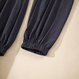 Close-up of black elastic cuff detail on women's beach jumpsuit by Trendsi