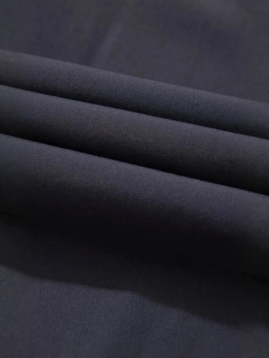Close-up of black fabric texture for Trendsi women's beach jumpsuit showing smooth and soft material