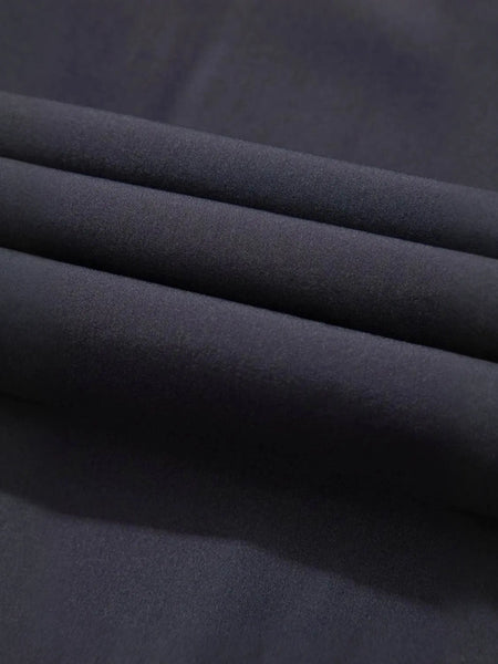 Close-up of black fabric texture for Trendsi women's beach jumpsuit showing smooth and soft material