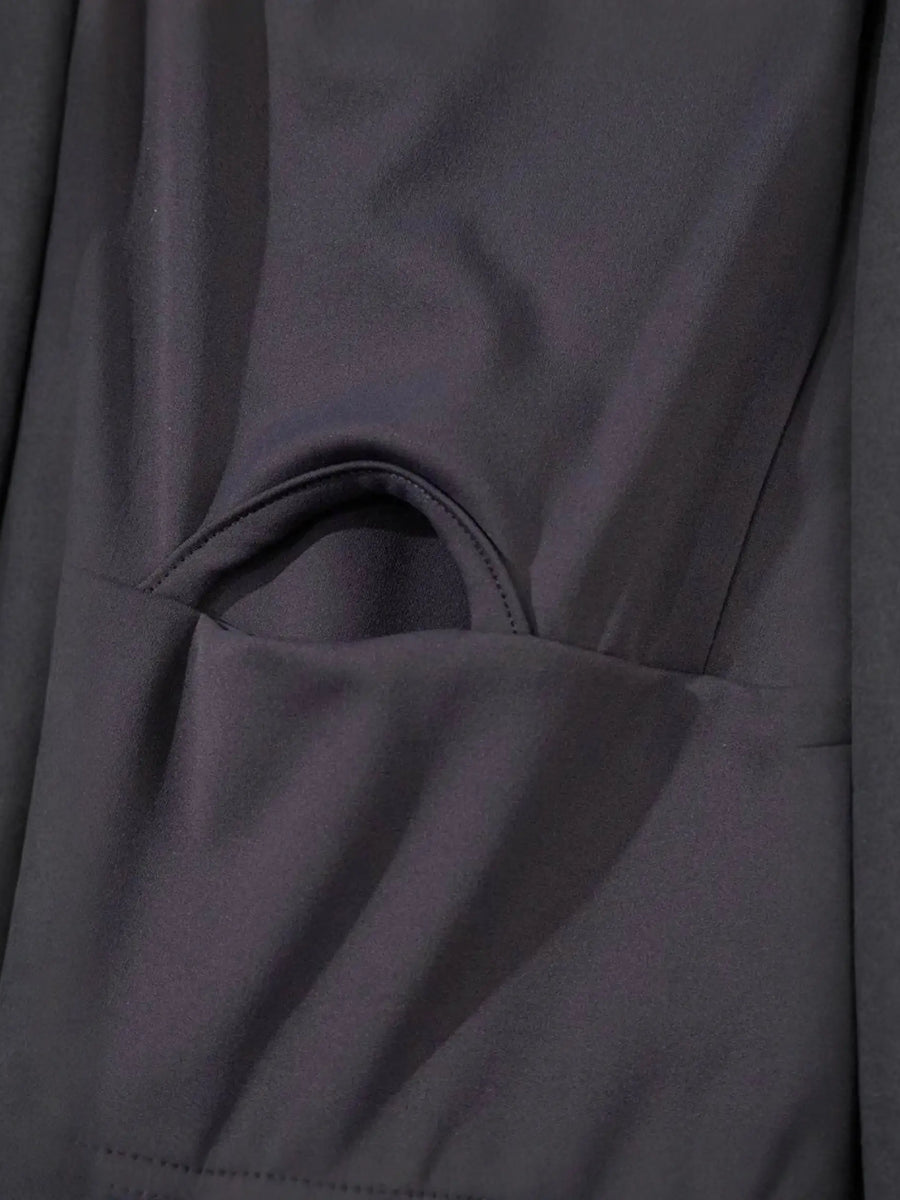 Close-up of black fabric pocket detail on Trendsi women's beach jumpsuit athletic style