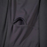 Close-up of black fabric pocket detail on Trendsi women's beach jumpsuit athletic style
