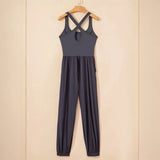 Trendsi women's beach jumpsuit in dark fabric with crisscross back straps and elastic ankle cuffs