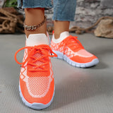 Trendsi women's breathable beach sneakers in bright orange with white soles and knit design