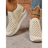 Trendsi women's breathable wedge sneakers in beige with heart-shaped cutouts and white sole
