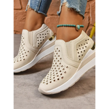 Trendsi women's breathable wedge sneakers in beige with perforated design and white sole