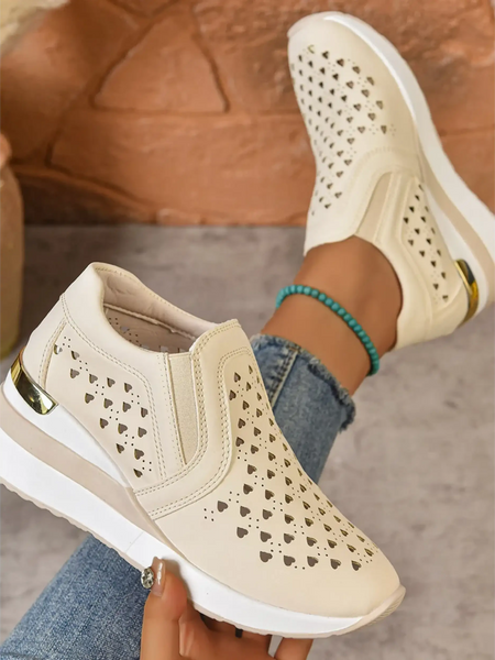 Trendsi women's breathable wedge sneakers in beige with perforated heart design and white sole