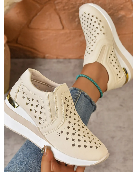 Trendsi women's breathable wedge sneakers in beige with perforated heart design and white sole